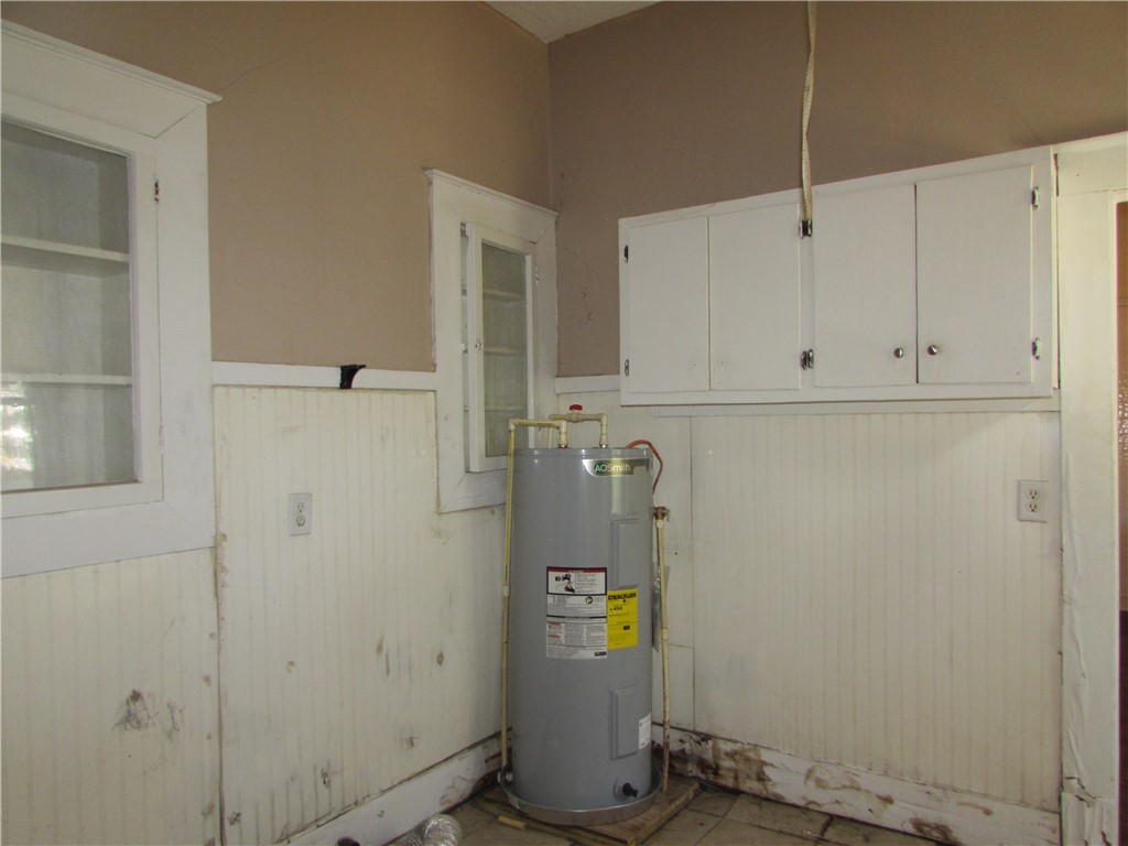 1003 Carswell Avenue Waycross, GA 31503 - Photo 18 of 25 Laundry Room. You can see the built-in cabinets