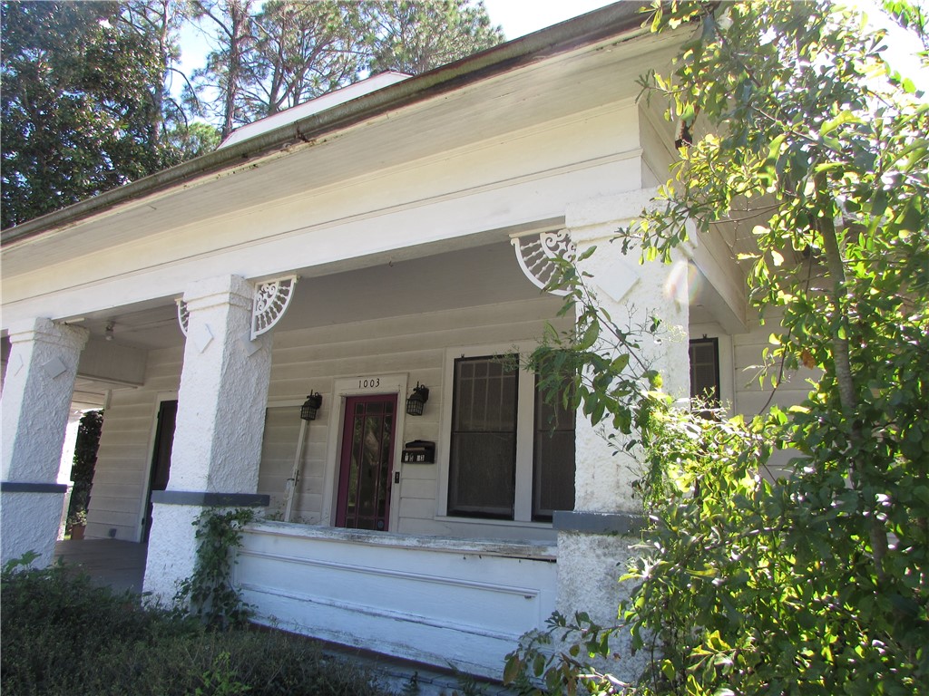 1003 Carswell Avenue Waycross, GA 31503 - Photo 3 of 25 Look at the beautiful detail on the wood trim!