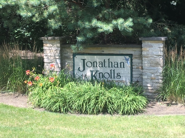 39600 Orchard Bluff Lane Wadsworth, IL 60083 - Photo 2 of 5 a sign that is sitting in front of flowers