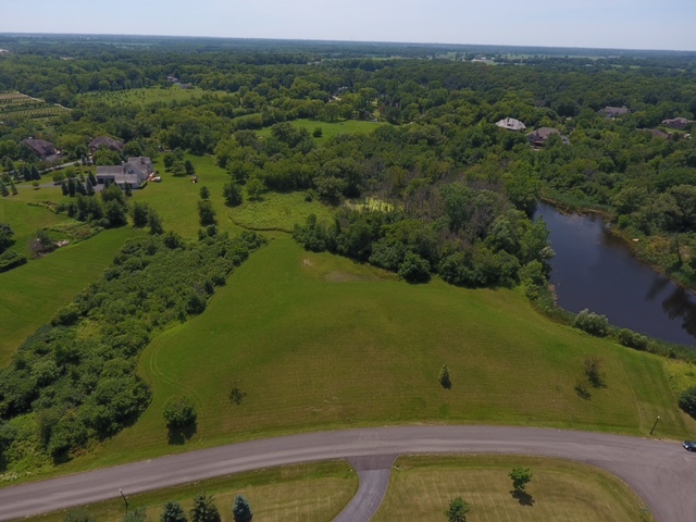 39600 Orchard Bluff Lane Wadsworth, IL 60083 - Photo 3 of 5 an aerial view of a residential houses with outdoor space and trees