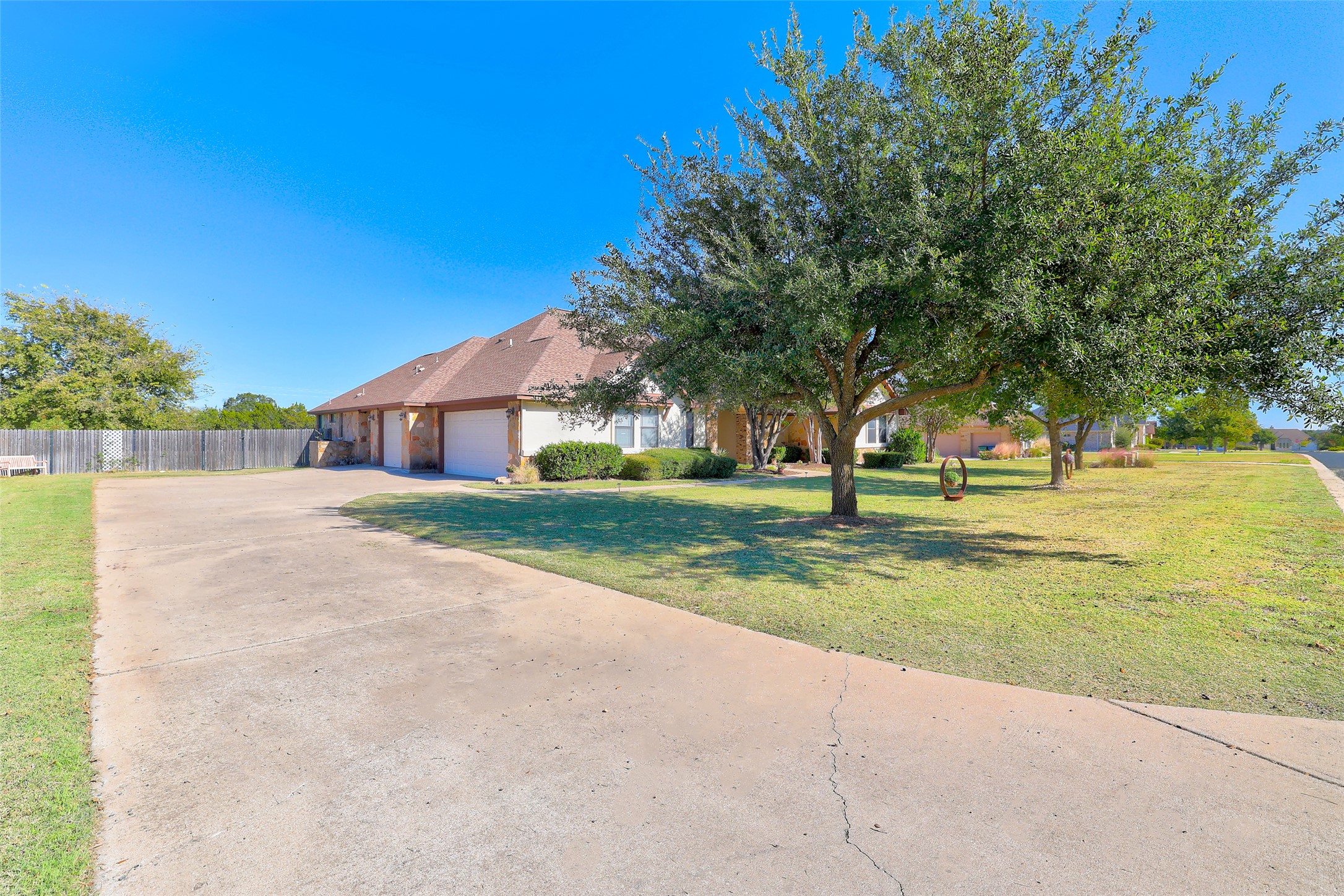 Undisclosed Address Georgetown, TX 78633 - Photo 8 of 39 a house with garden in front of it