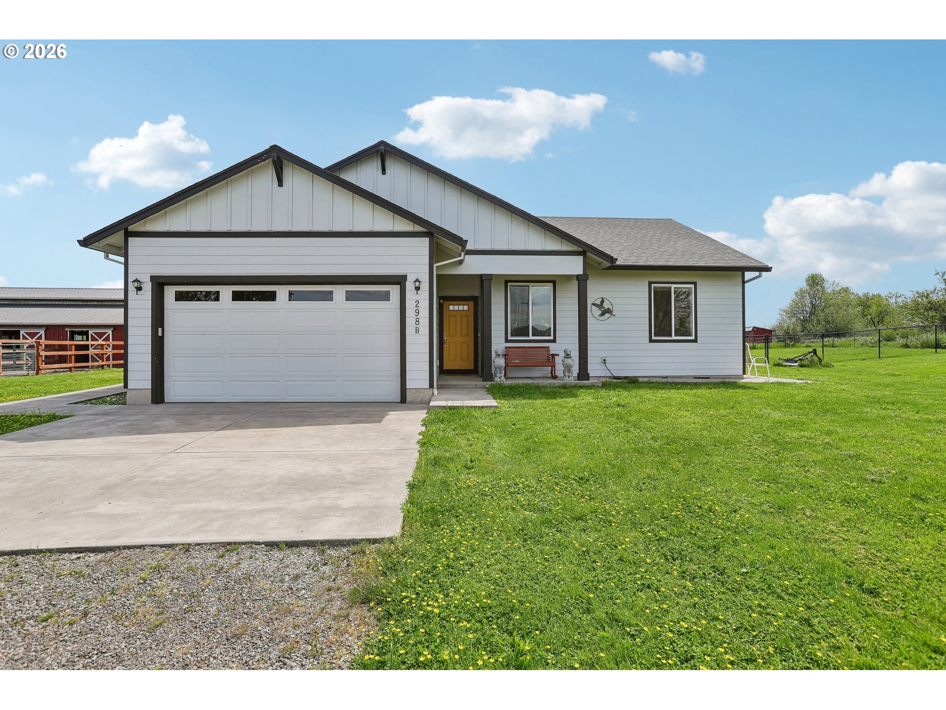 298 Roberson Road Woodland, WA 98674 - Photo 31 of 48 a front view of house with backyard and green space