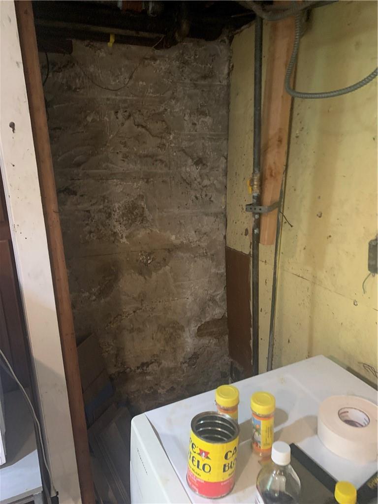 3384 Ely Avenue Bronx, NY 10469 - Photo 11 of 11 a bathroom with a sink and a mirror