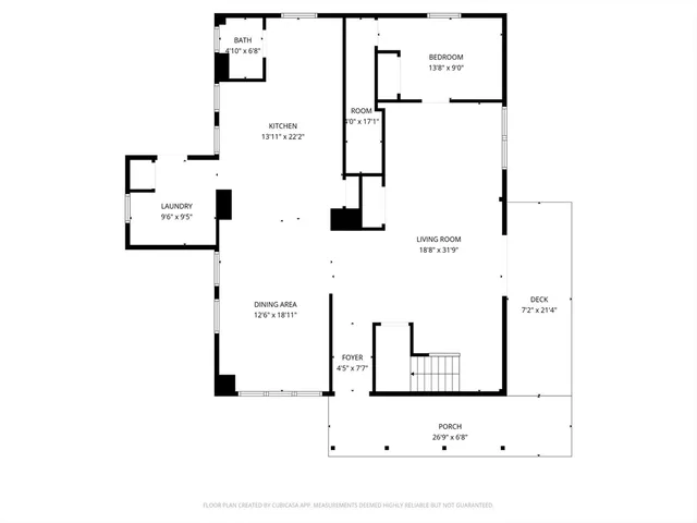 a picture of bathroom with a white wall and a white wall