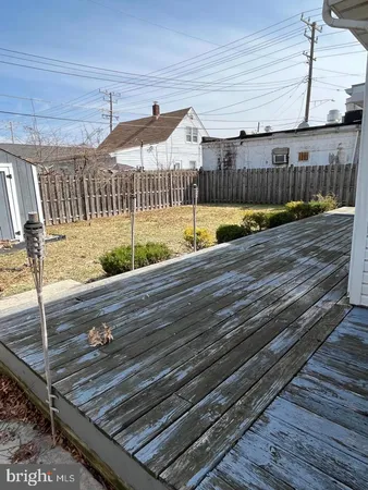 a view of small pool with a outdoor seating
