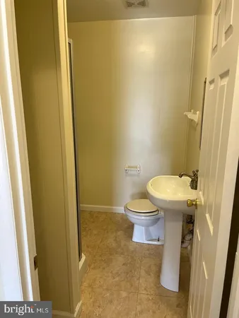 a bathroom with a sink and a toilet