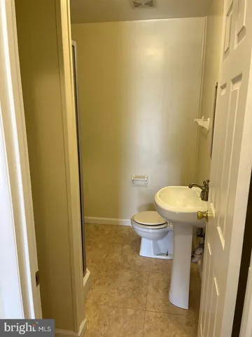 a bathroom with a sink and a toilet