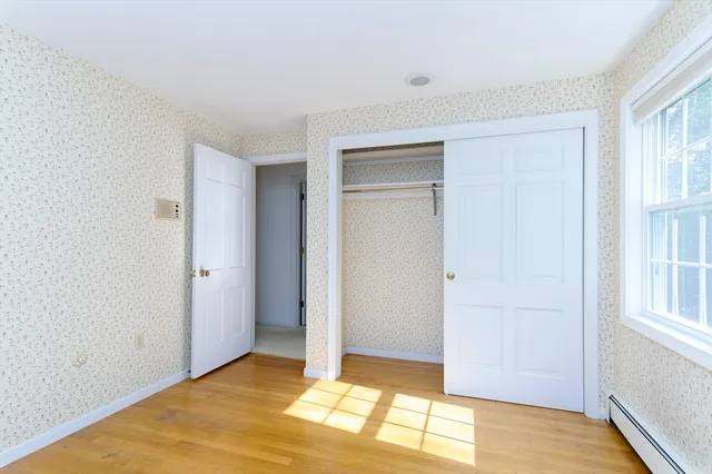 a view of livingroom with an empty space and window