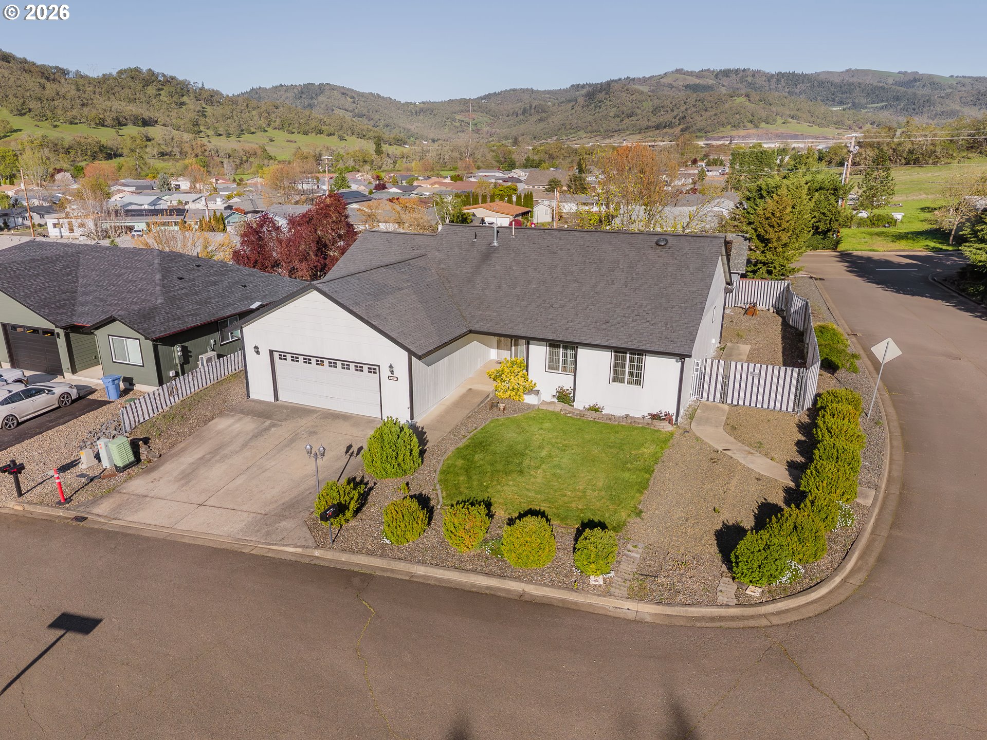 101 Pleasant Street Roseburg, OR 97470 - Photo 1 of 43 an aerial view of residential houses and outdoor space