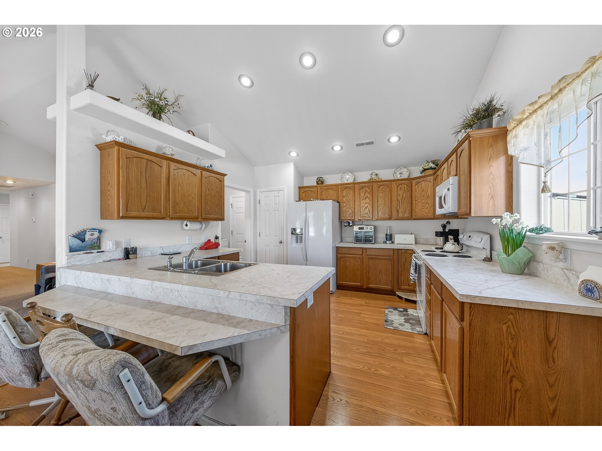 101 Pleasant Street Roseburg, OR 97470 - Photo 11 of 43 a kitchen with a sink appliances and cabinets
