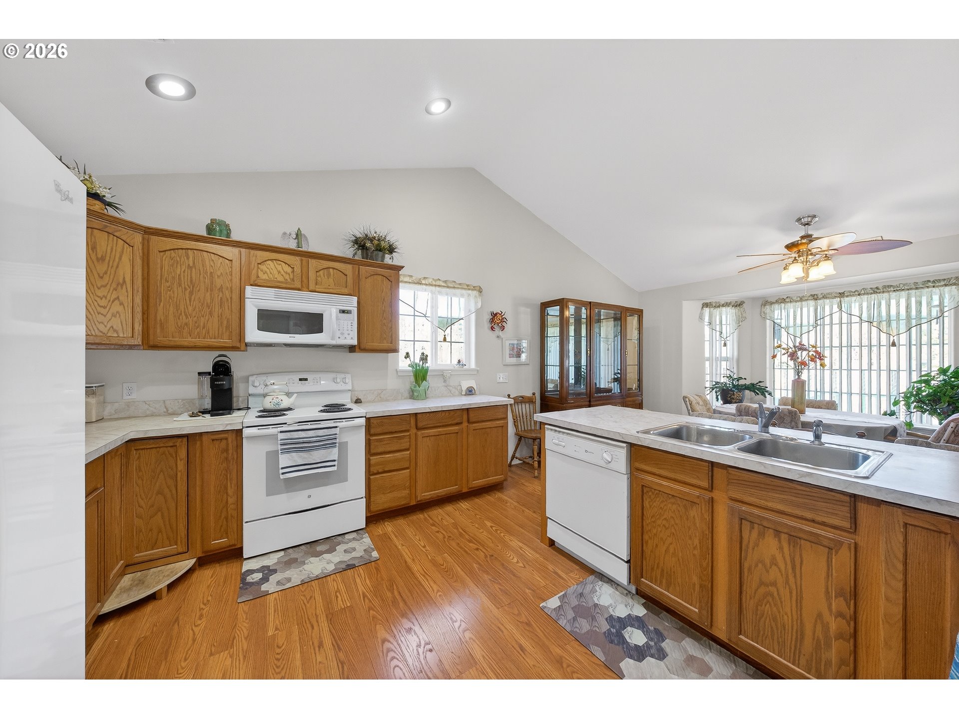 101 Pleasant Street Roseburg, OR 97470 - Photo 13 of 43 a kitchen with sink a stove and cabinets