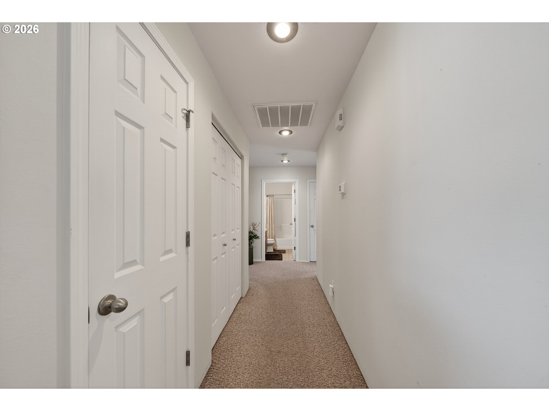 101 Pleasant Street Roseburg, OR 97470 - Photo 14 of 43 a view of a hallway with wooden floor
