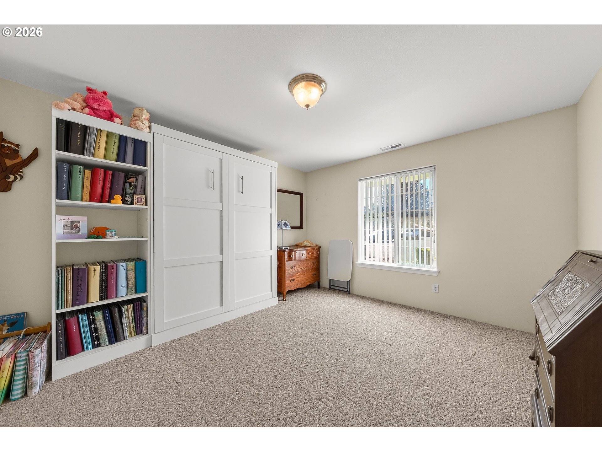 101 Pleasant Street Roseburg, OR 97470 - Photo 20 of 43 a view of a livingroom with a bookshelf