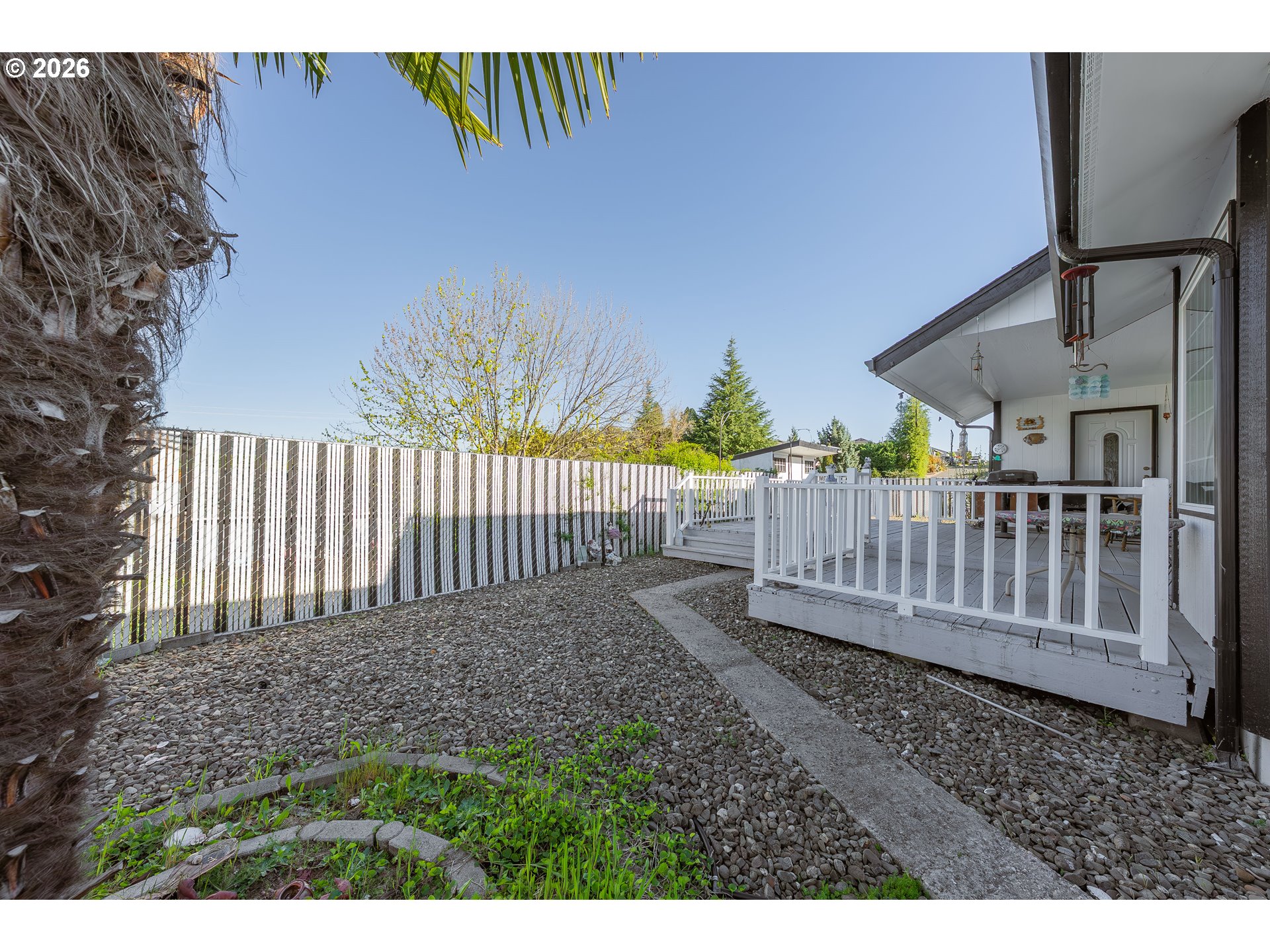 101 Pleasant Street Roseburg, OR 97470 - Photo 27 of 43 a view of a wooden fence