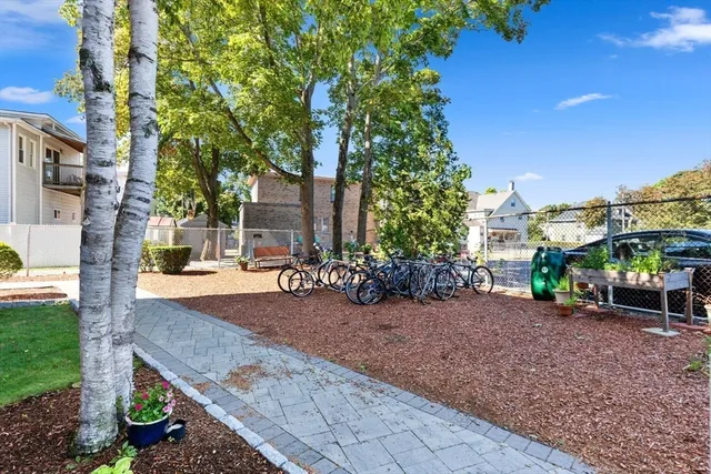 a view of a backyard with sitting area