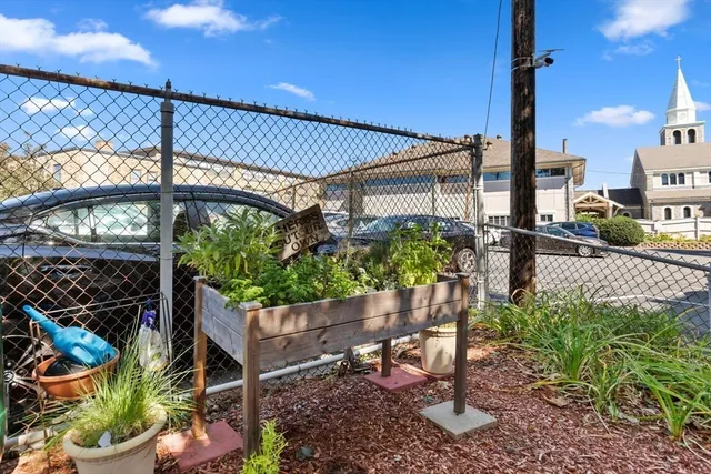 a view of a street with sitting area
