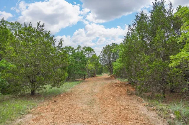 a view of a city with an aerial view of residential houses with outdoor space