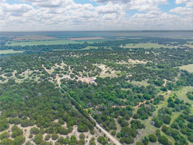a view of a city with lots of trees