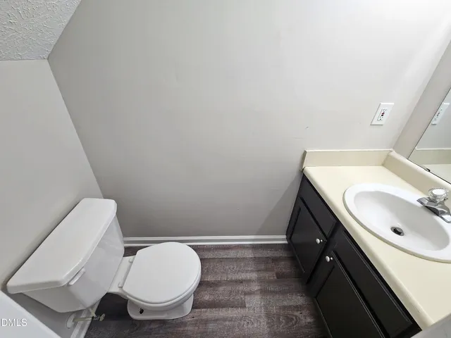 a kitchen with stainless steel appliances granite countertop a stove and a refrigerator