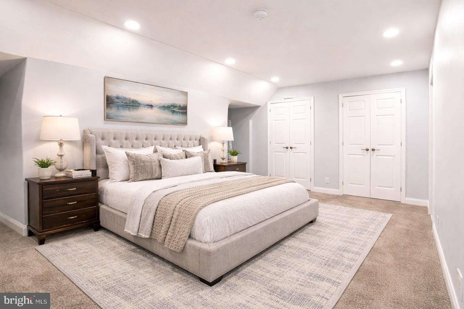 7722 Old York Road Elkins Park, PA 19027 - Photo 19 of 37 a bedroom with a bed and a lamp