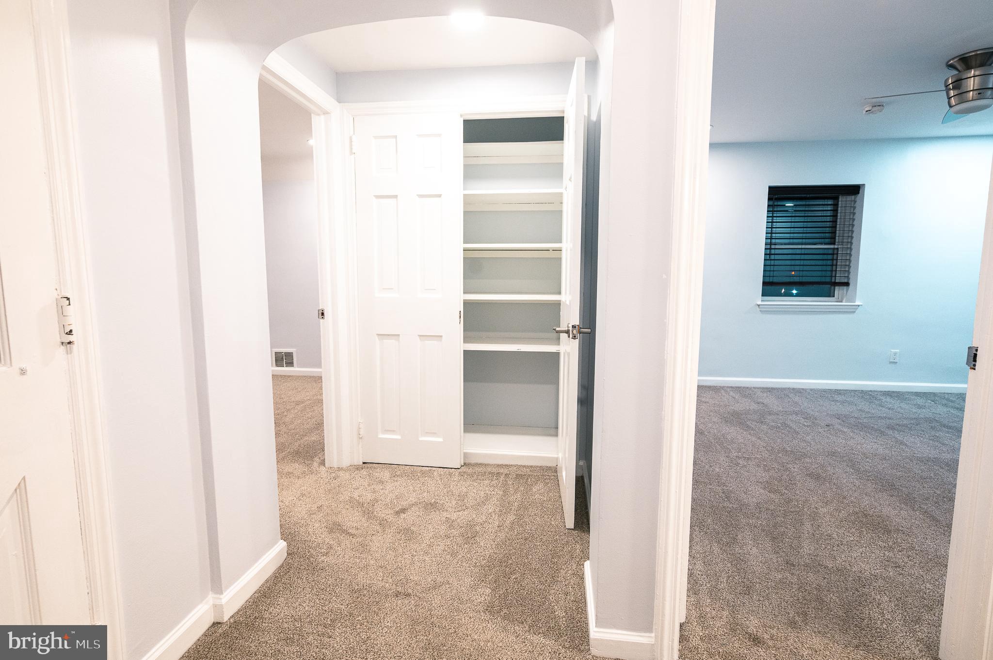 7722 Old York Road Elkins Park, PA 19027 - Photo 25 of 37 a view of an empty room with cabinet and mirror