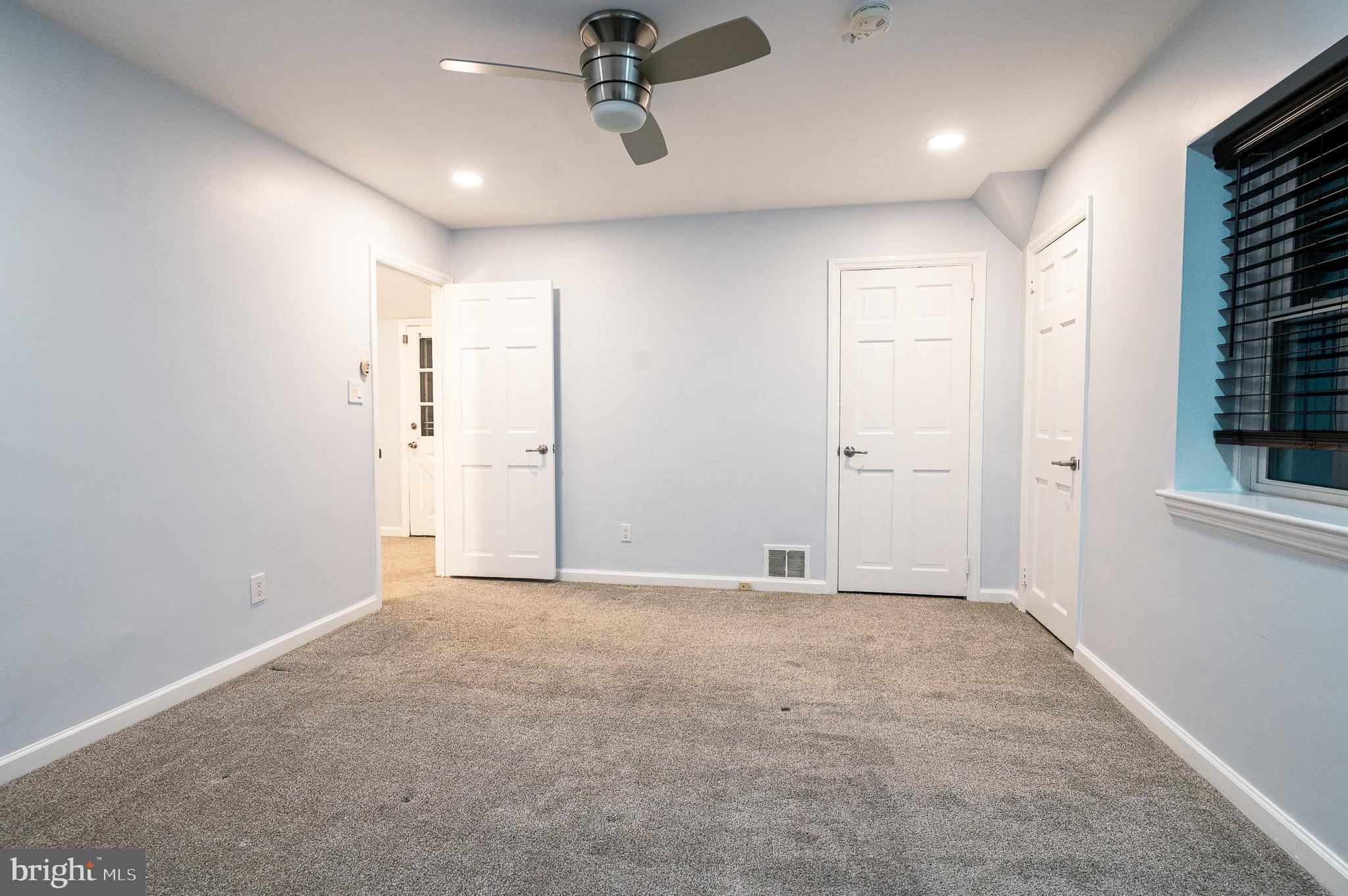 7722 Old York Road Elkins Park, PA 19027 - Photo 26 of 37 an empty room with fan and windows