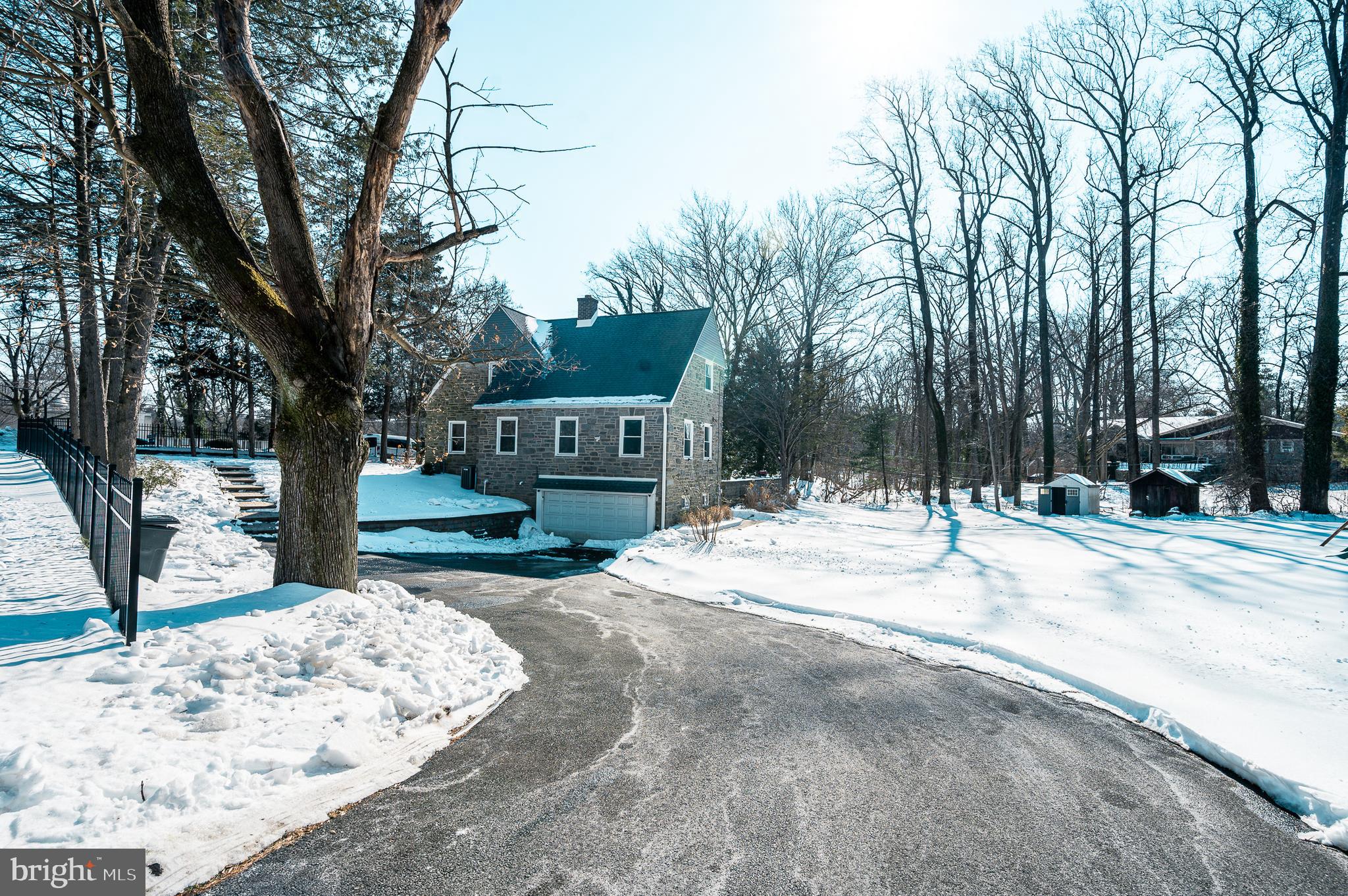7722 Old York Road Elkins Park, PA 19027 - Photo 3 of 37 a house with trees in front of it