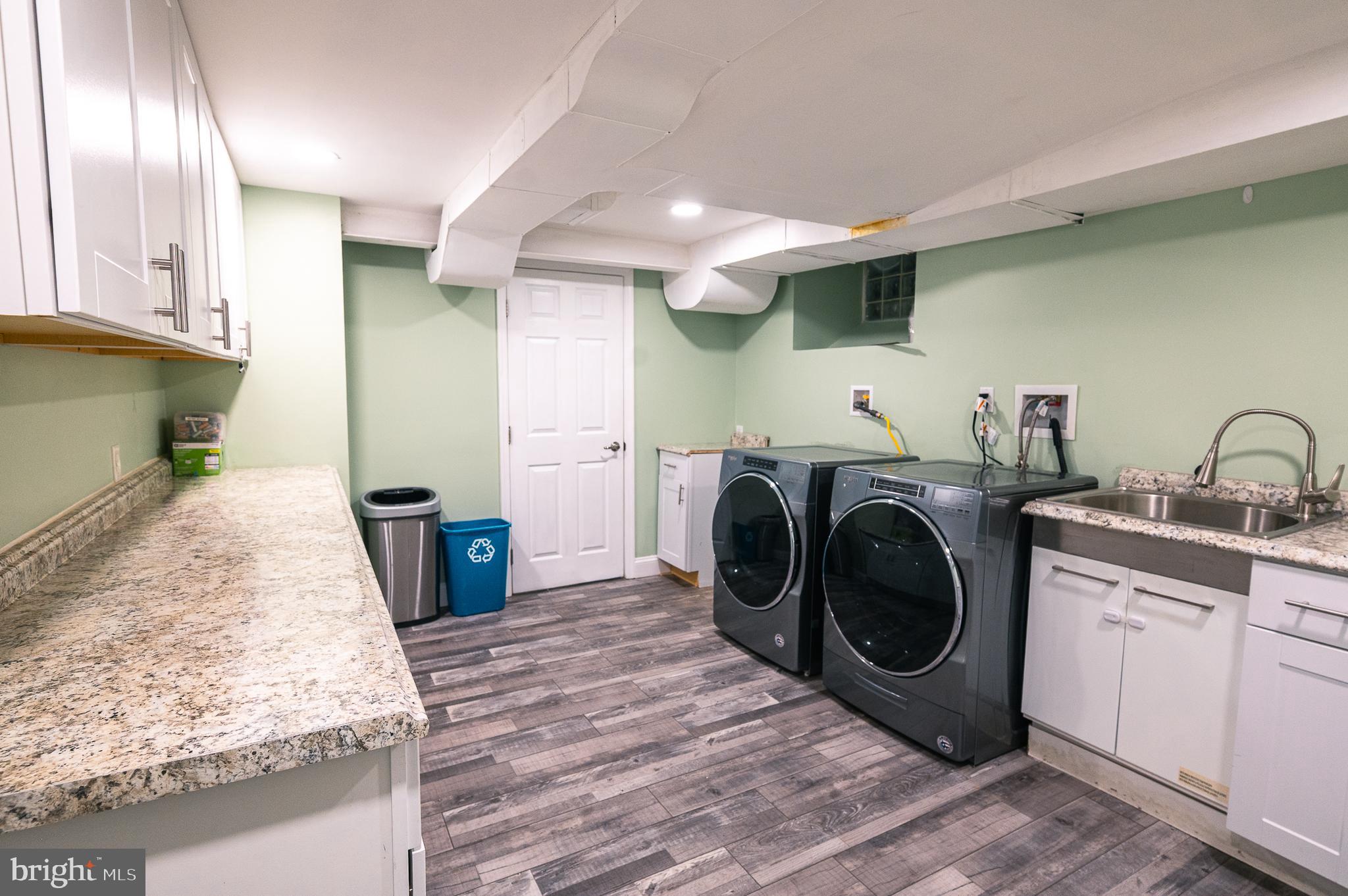 7722 Old York Road Elkins Park, PA 19027 - Photo 34 of 37 a utility room with sink dryer and washer