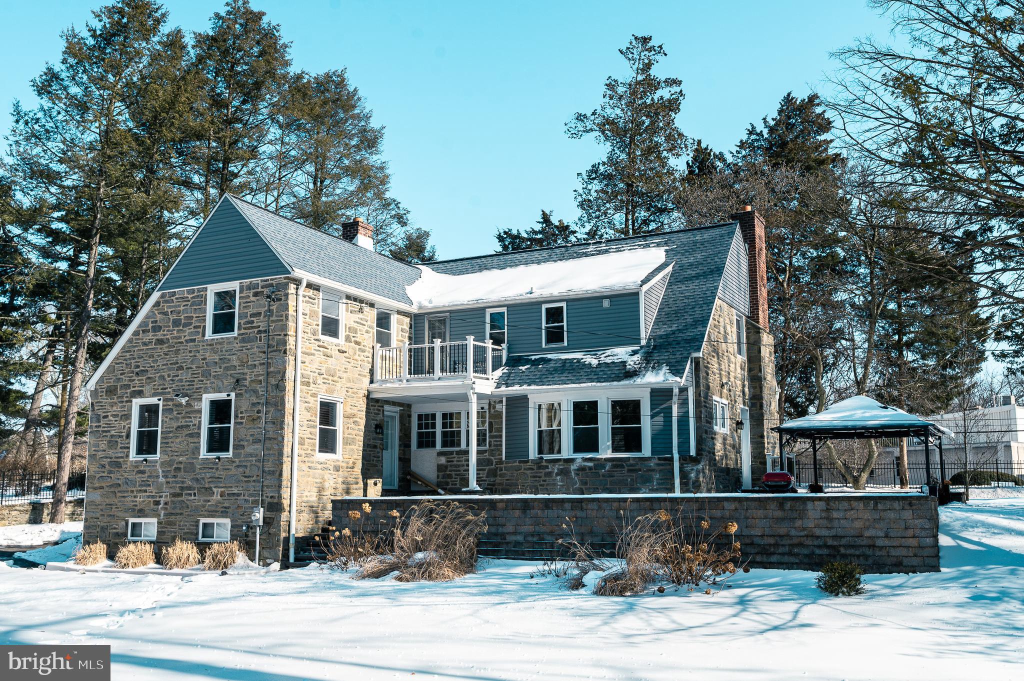 7722 Old York Road Elkins Park, PA 19027 - Photo 36 of 37 a front view of a house with a yard