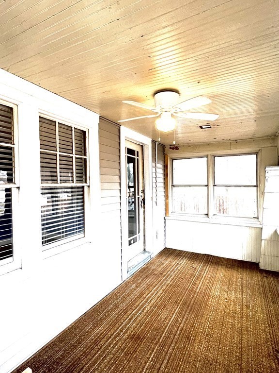 238 Edendale Street Springfield, MA 01104 - Photo 3 of 29 a view of a room with wooden floor and windows