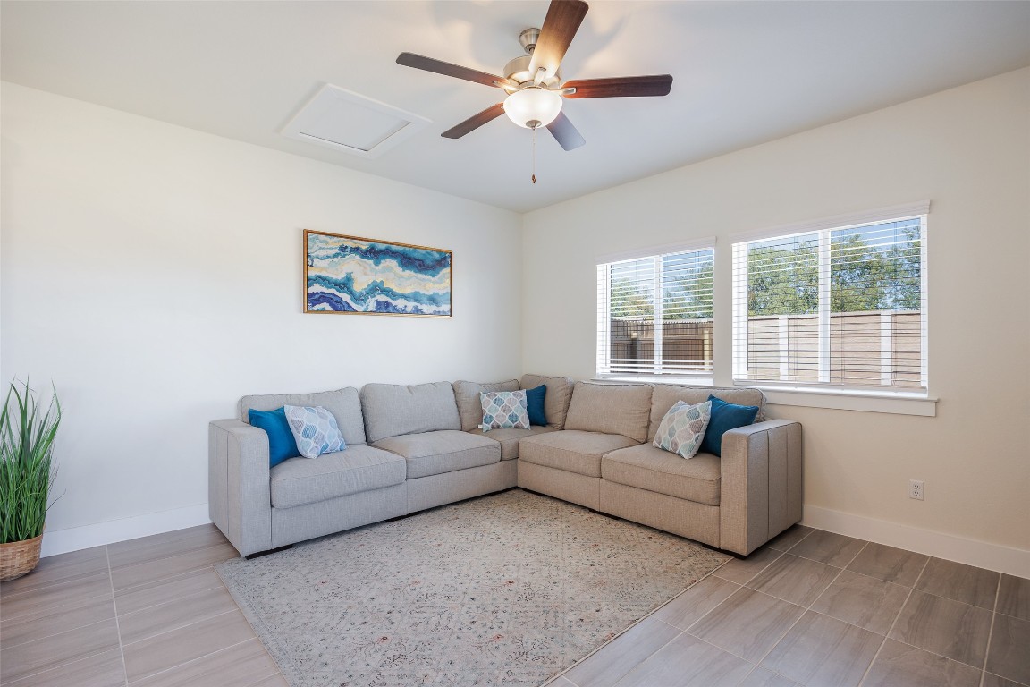 322 Furlong Drive Georgetown, TX 78626 - Photo 17 of 23 a living room with furniture and a large window