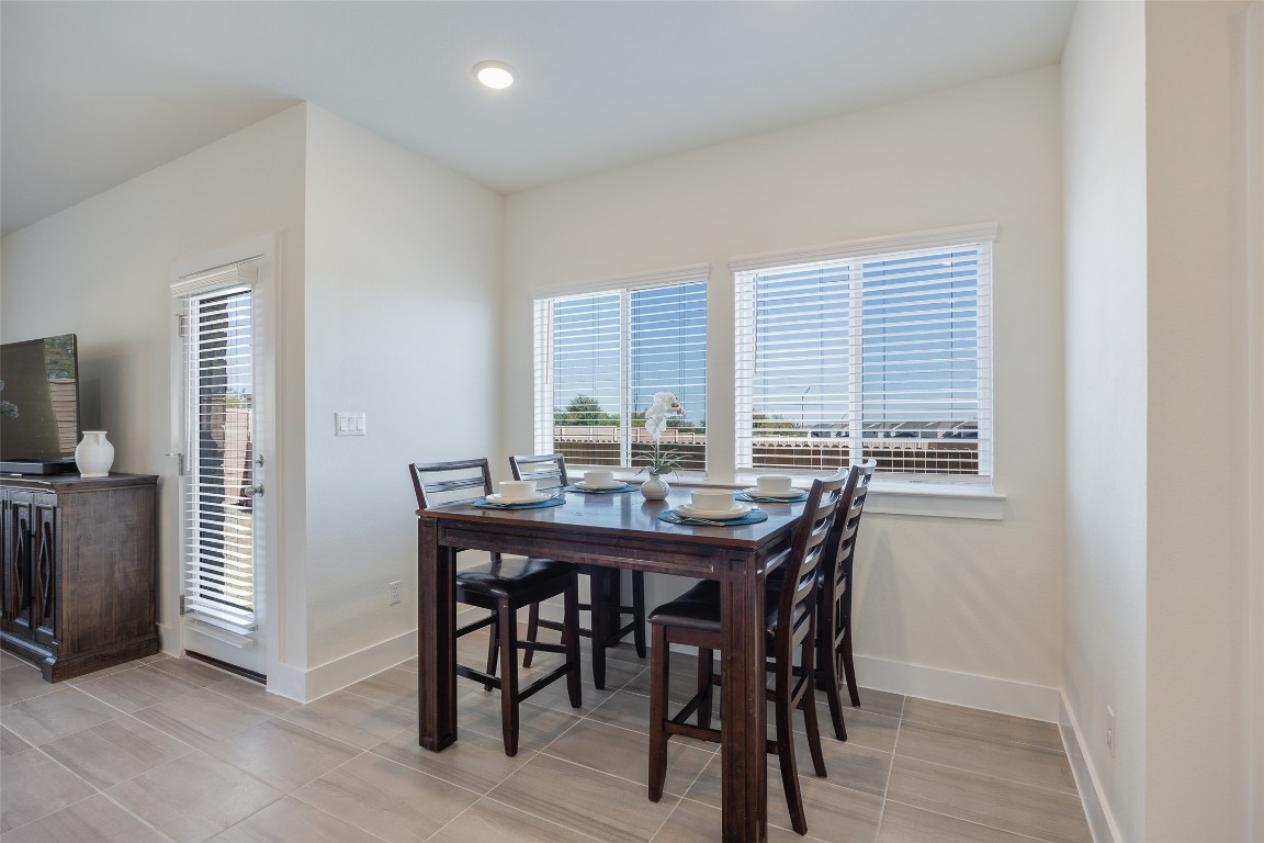 322 Furlong Drive Georgetown, TX 78626 - Photo 5 of 23 a view of a dining room with furniture and window
