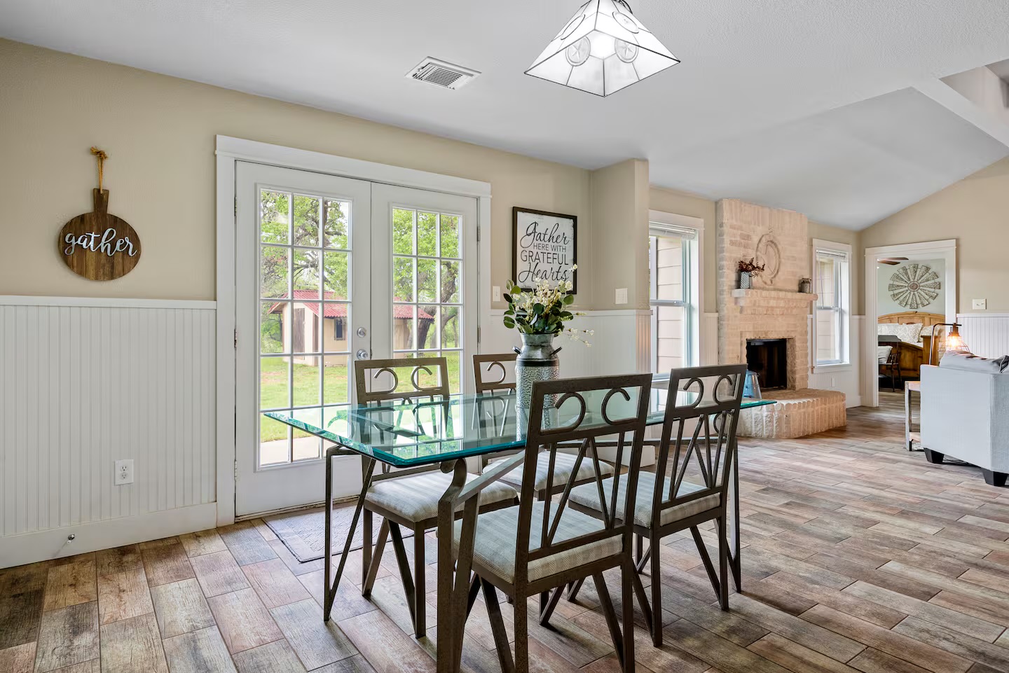 801 John Knox Road Fischer, TX 78623 - Photo 9 of 17 a view of a dining room with furniture window and wooden floor