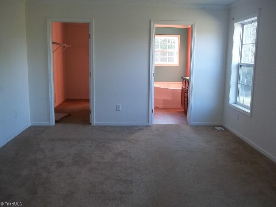 199 Cockman Road Robbins, NC 27325 - Photo 8 of 15 Master bedroom with walk-in closet and bath