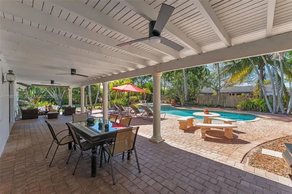 a outdoor space with chairs a couch and chairs