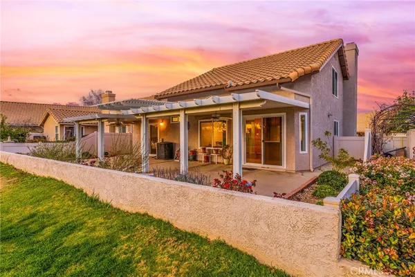 front view of a house with a patio
