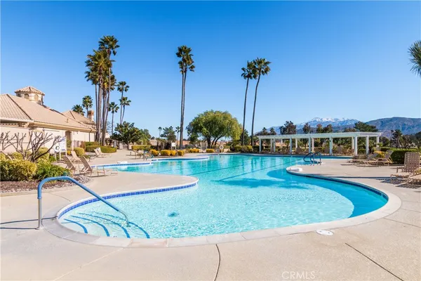 a view of a city with mountains in the background