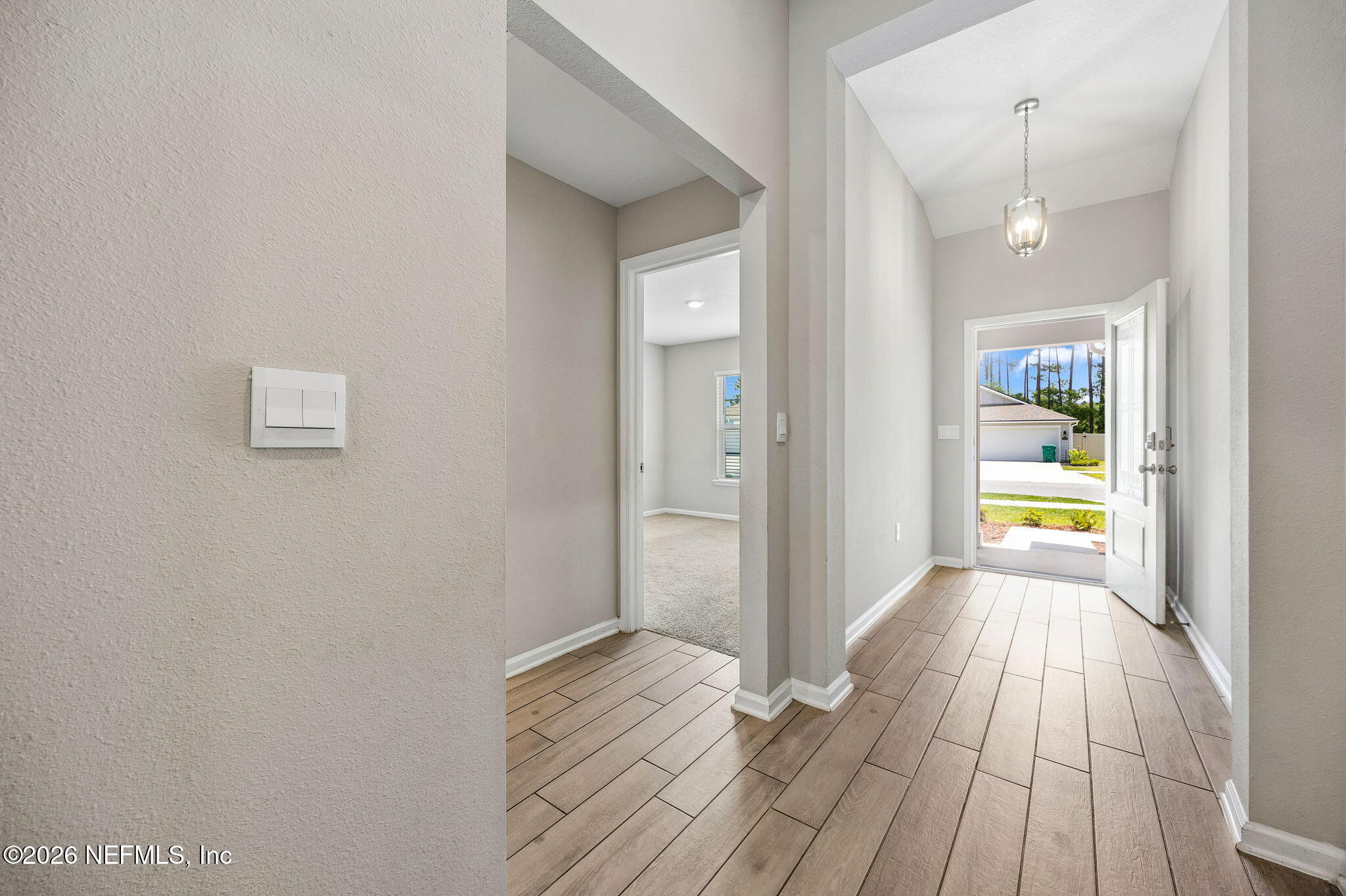 65908 Edgewater Drive Yulee, FL 32097 - Photo 22 of 49 Entry Reverse Left