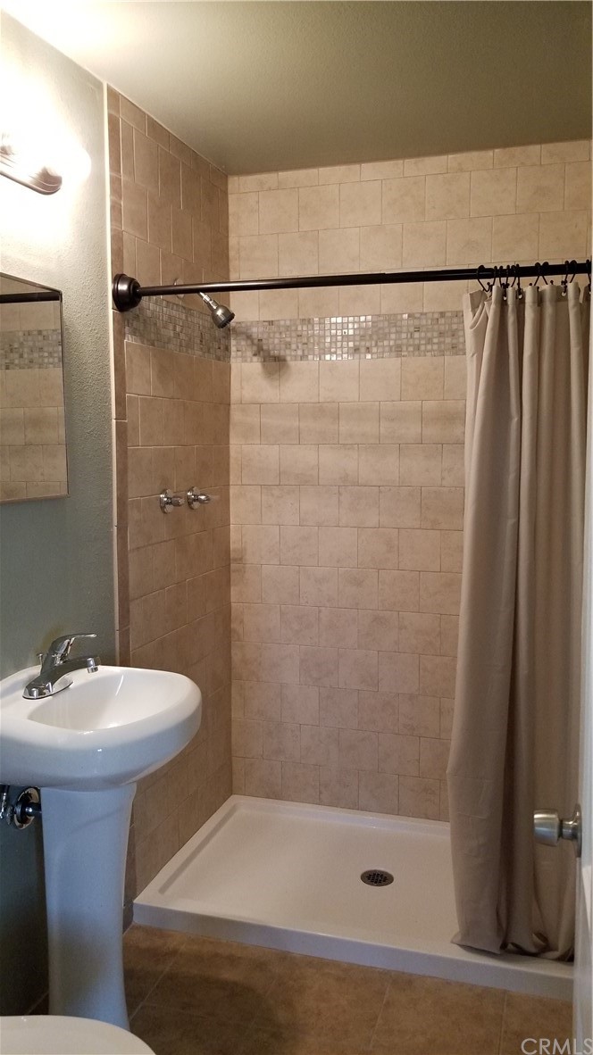 61750 Desert Air Road Joshua Tree, CA 92252 - Photo 28 of 28 a bathroom with a sink and a mirror