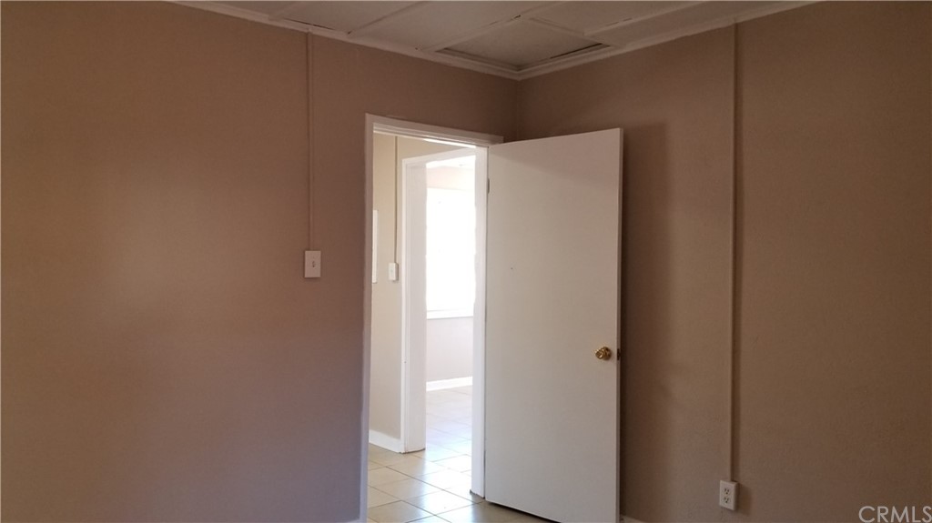 61750 Desert Air Road Joshua Tree, CA 92252 - Photo 10 of 28 a kitchen with a refrigerator and sink