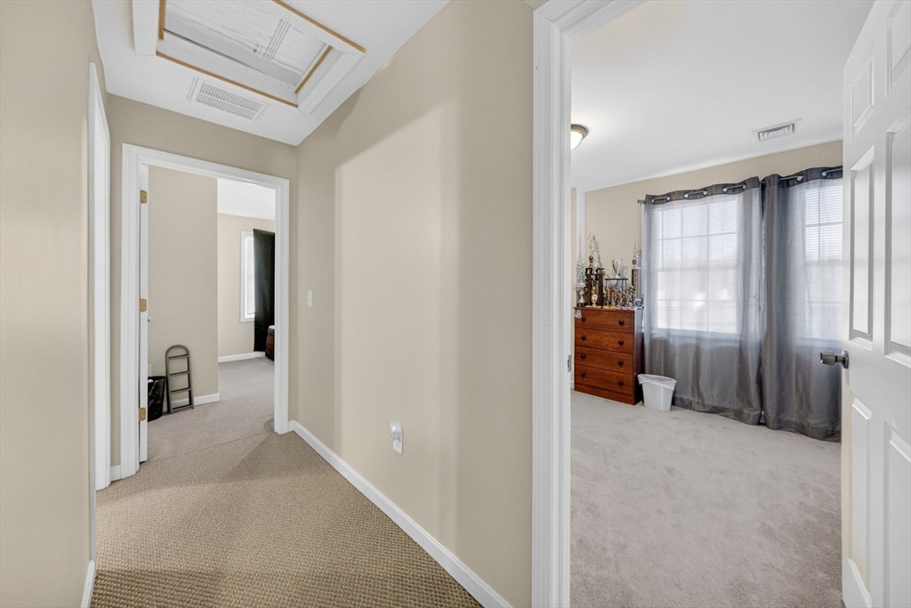 321 King Street Fall River, MA 02724 - Photo 18 of 40 a view of a bedroom with a tub and shower