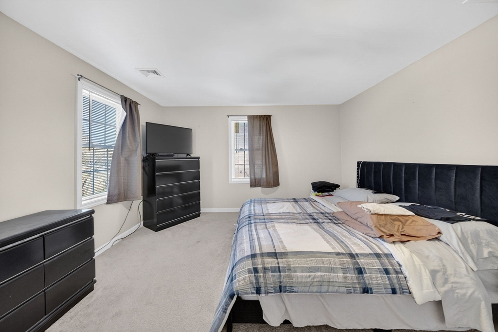 321 King Street Fall River, MA 02724 - Photo 21 of 40 a bedroom with a bed and a television