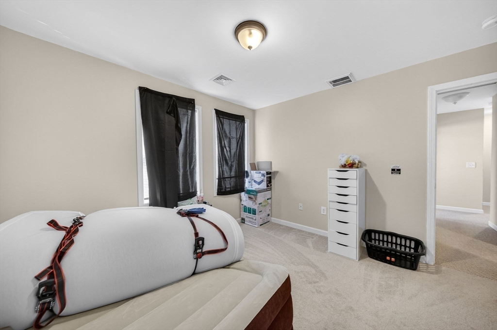 321 King Street Fall River, MA 02724 - Photo 26 of 40 a bedroom with furniture and a closet