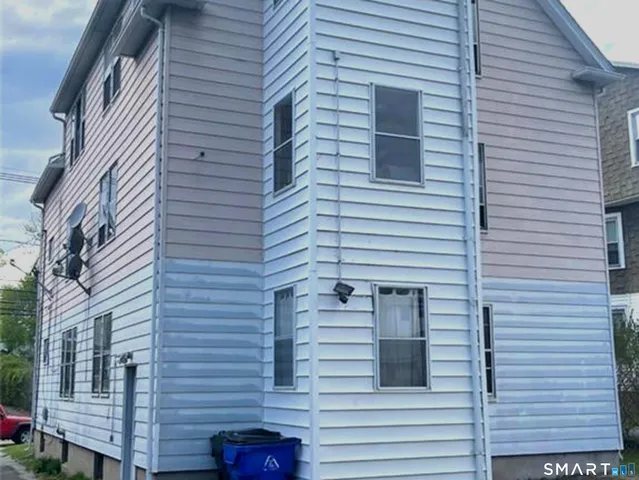 a view of a house with a street