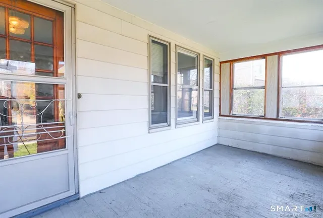 an empty room with windows