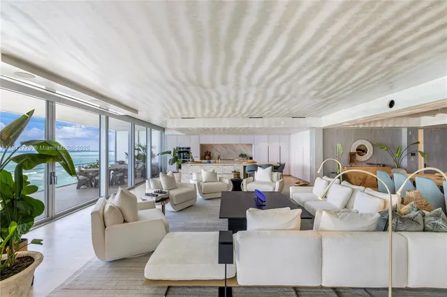 a view of swimming pool with seating space