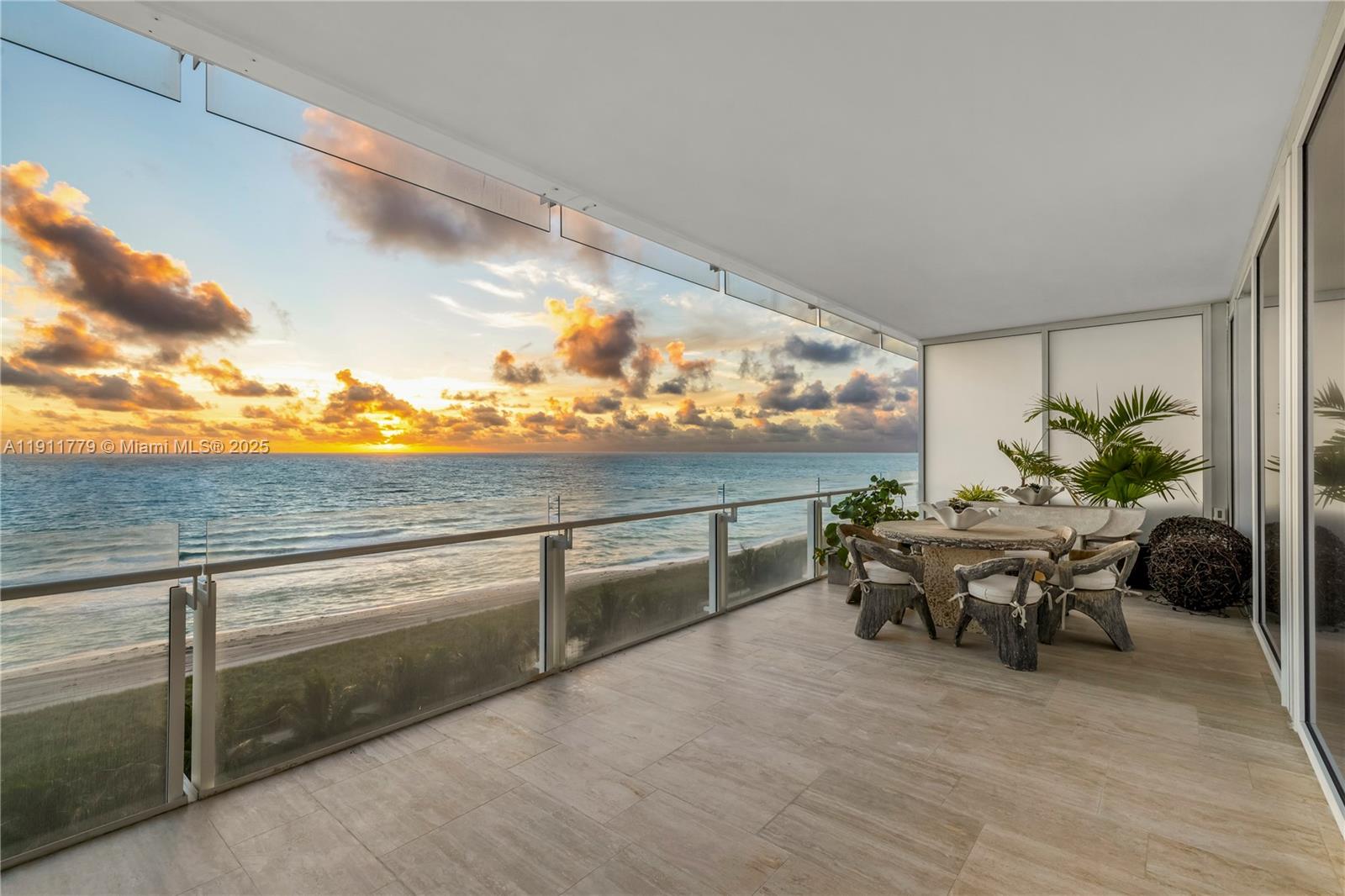 9111 Collins Avenue, Unit N721 Surfside, FL 33154 - Photo 28 of 52 a outdoor living space with furniture