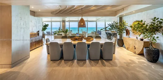 a bedroom with a bed and glass window