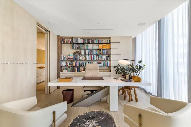 a view of a kitchen and dining room