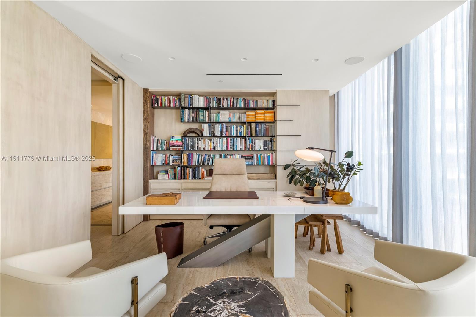 9111 Collins Avenue, Unit N721 Surfside, FL 33154 - Photo 7 of 52 a view of a kitchen and dining room